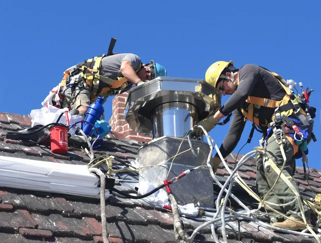 Protective chimney cap installed by Hamden Chimney Sweep in Hamden, CT