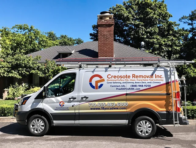 Hamden Chimney Sweep technician removing creosote safely in Hamden, CT